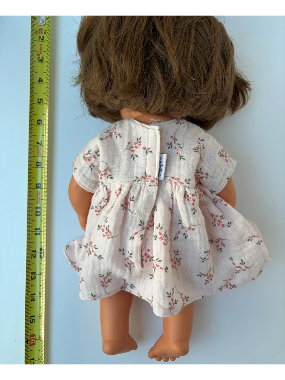 Miniland Doll 15'' Caucasian Brunette Girl with Down Syndrome in Muslin Dress